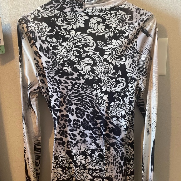 This is beautiful on. Stretchy fit.  Very flattering. - Picture 2 of 2